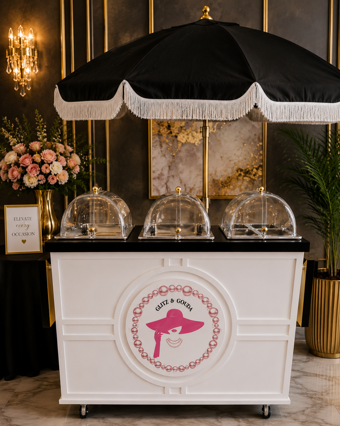 Luxury charcuterie box styled with cheeses, cured meats, and florals